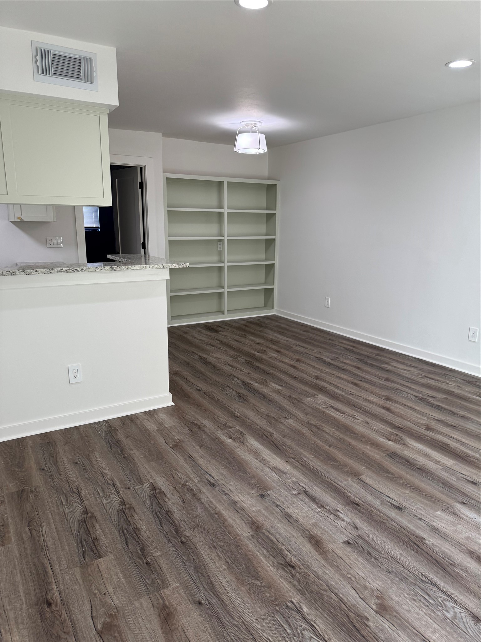 4747 Allendale Road, Unit 49 Houston, TX 77017 - Photo 6 of 8 a view of a room with wooden floor and cabinet