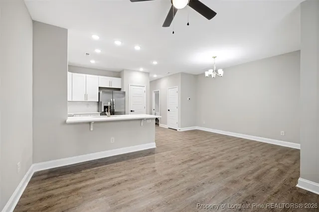 a view of kitchen with wooden floor