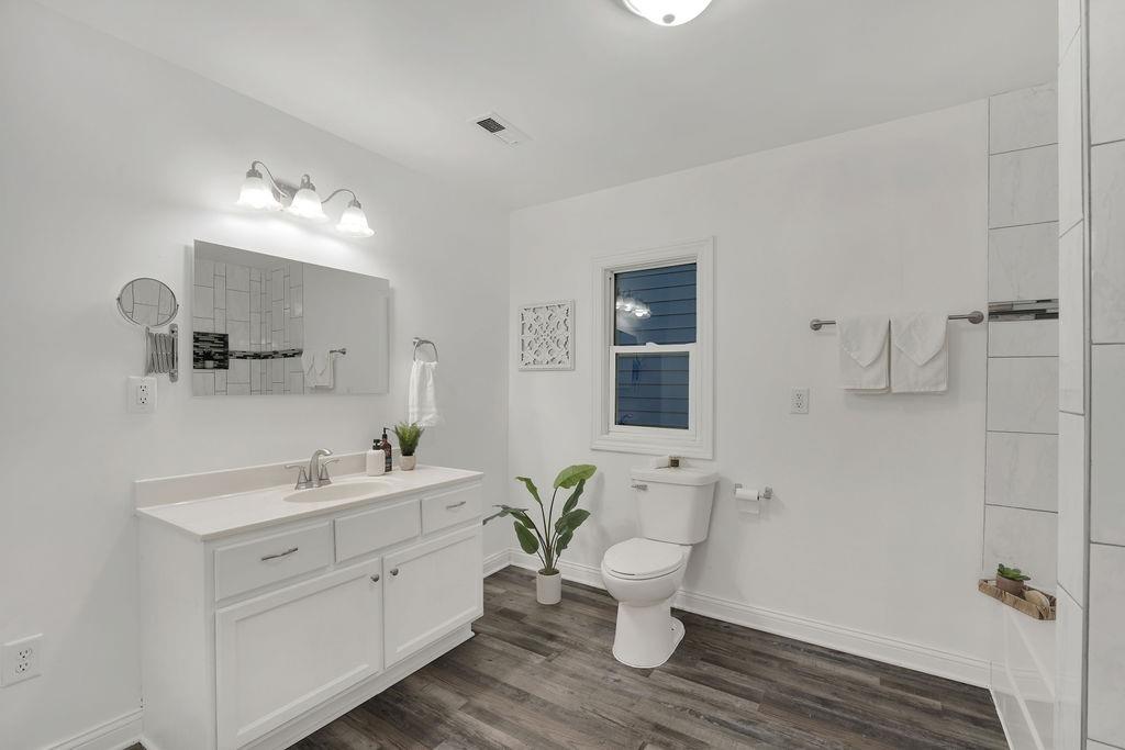 3714 Keck Place Gary, IN 46408 - Photo 14 of 24 a view of bathroom with a sink mirror and toilet