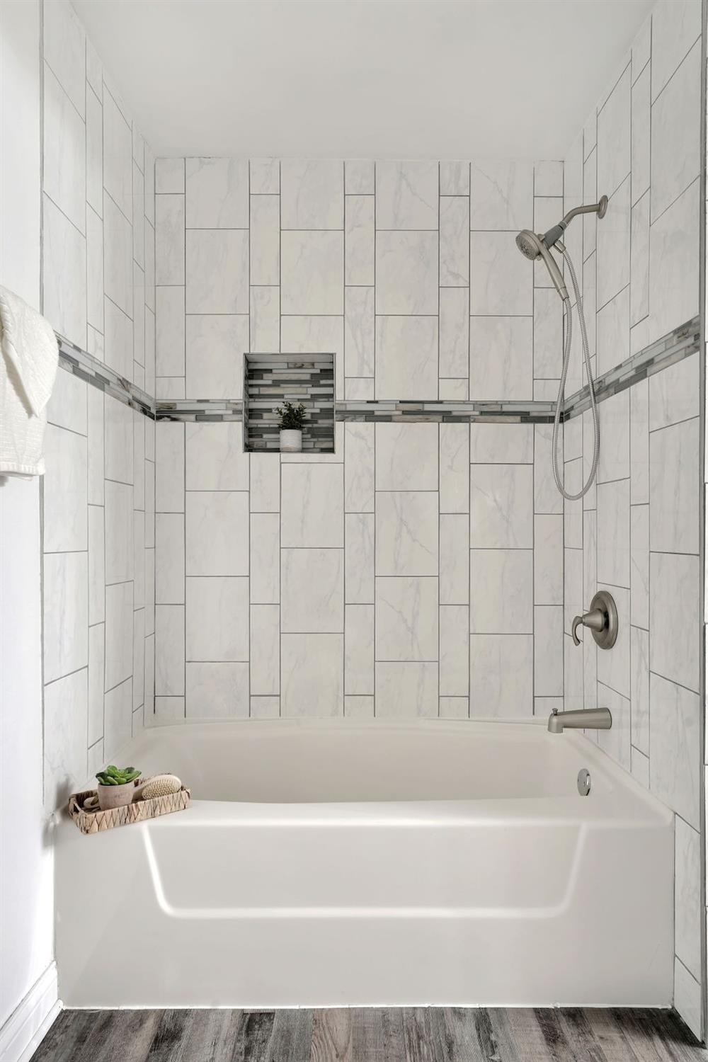 3714 Keck Place Gary, IN 46408 - Photo 15 of 24 a bathroom with a bathtub and a shower