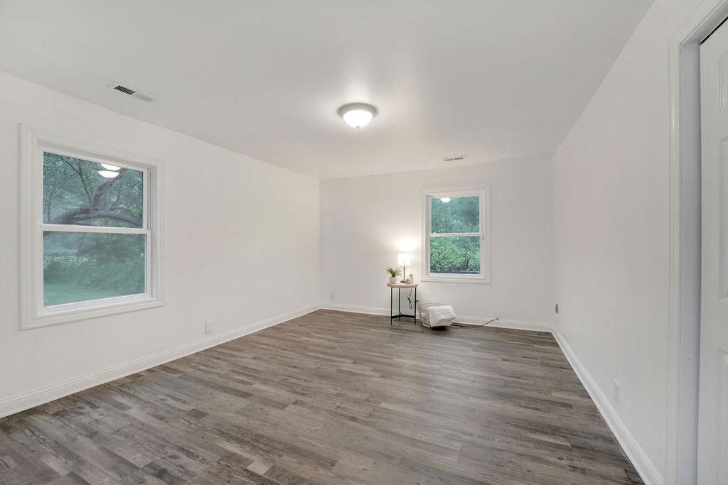 3714 Keck Place Gary, IN 46408 - Photo 18 of 24 a view of empty room with wooden floor and fan