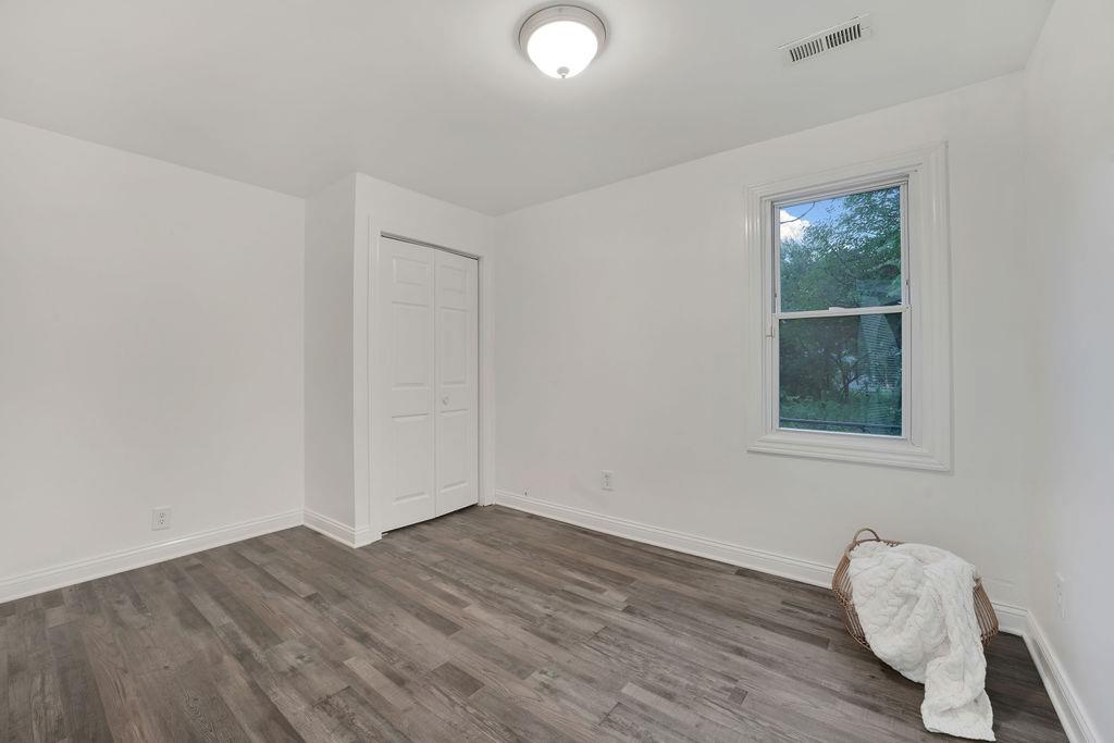 3714 Keck Place Gary, IN 46408 - Photo 19 of 24 a view of room with wooden floor and window