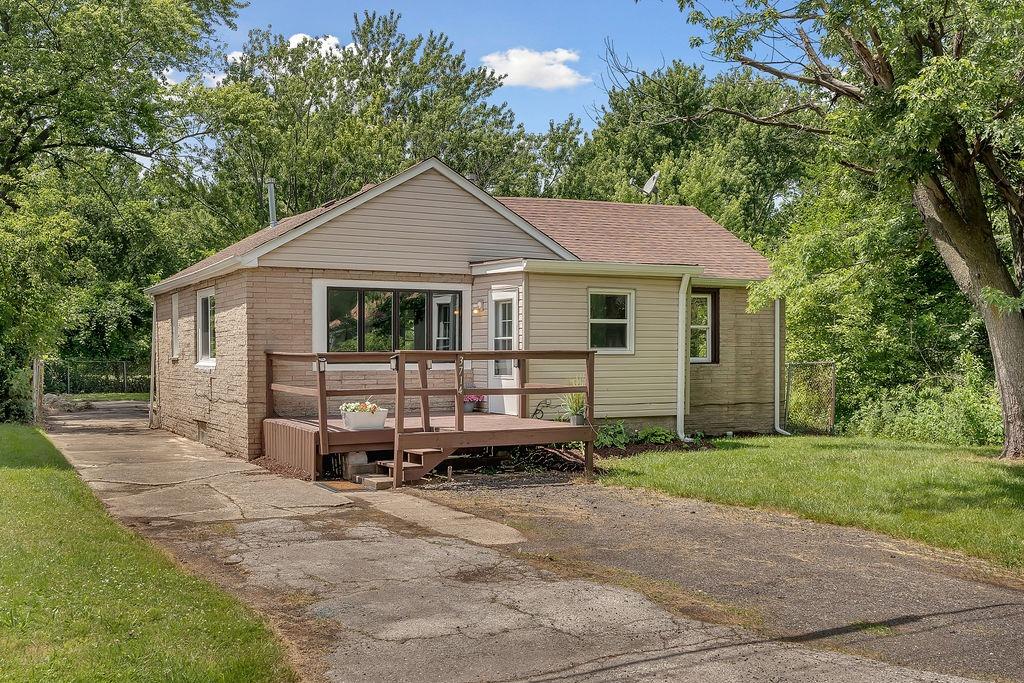 3714 Keck Place Gary, IN 46408 - Photo 2 of 24 a view of a house with a yard and large tree