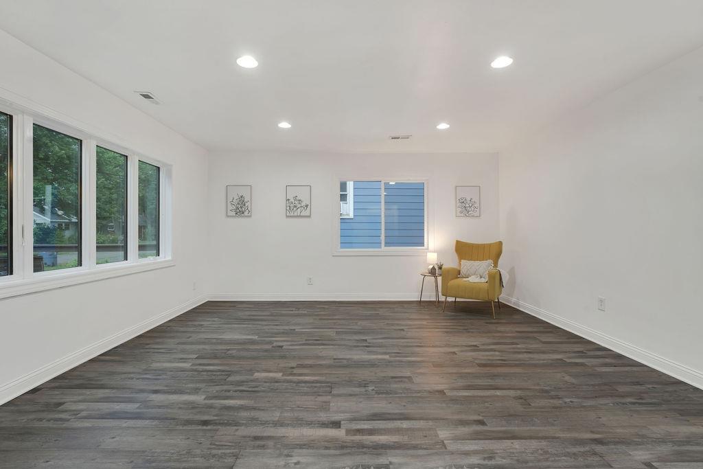 3714 Keck Place Gary, IN 46408 - Photo 6 of 24 a view of an empty room with a window and wooden floor