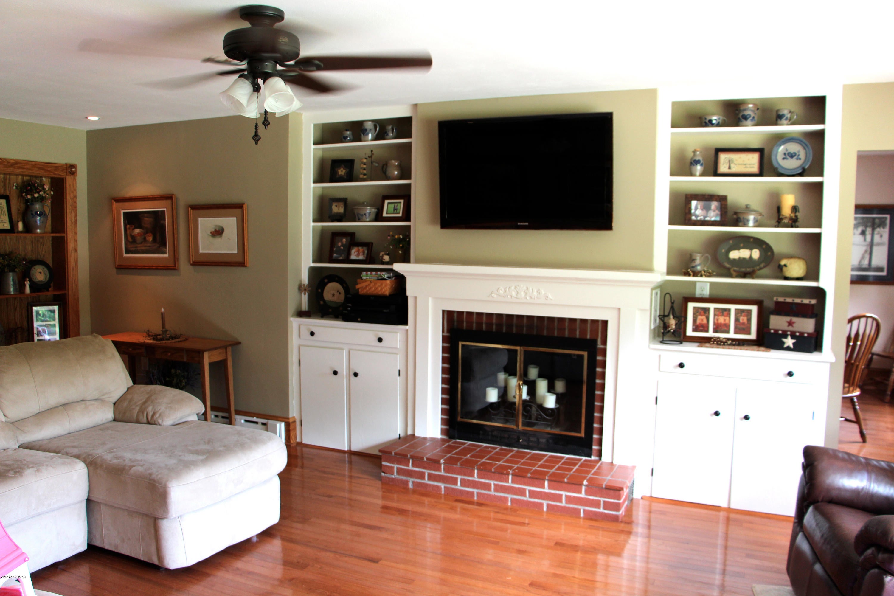 45 Pine Run Road Hughesville, PA 17737 - Photo 11 of 36 Living Room with Fireplace and Built-ins