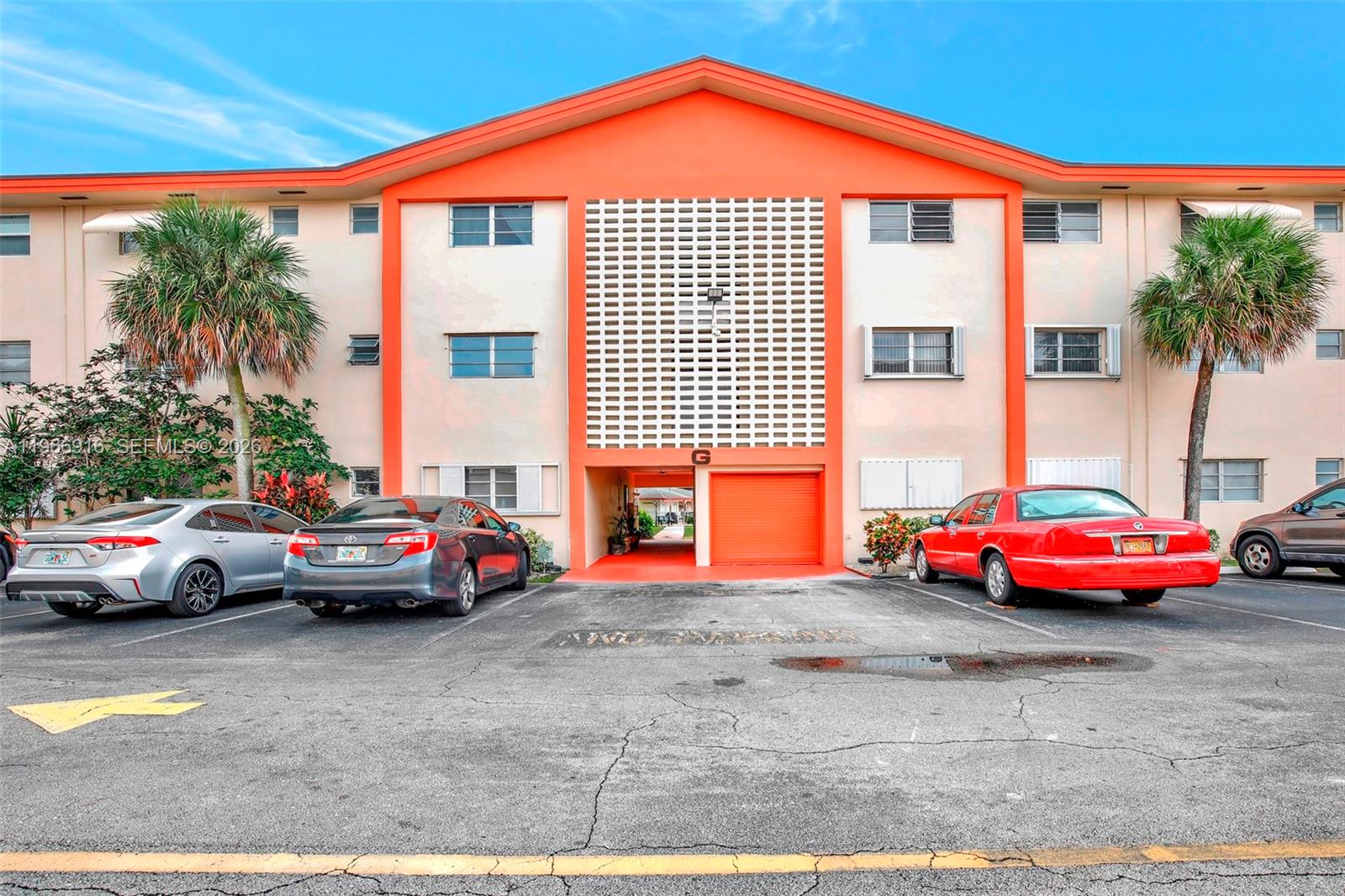 5300 Washington Street, Unit G127 Hollywood, FL 33021 - Photo 2 of 39 a view of city street with cars
