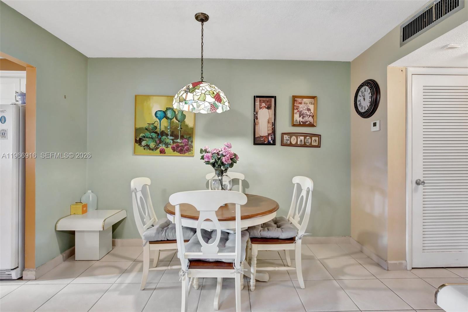 5300 Washington Street, Unit G127 Hollywood, FL 33021 - Photo 21 of 39 a dining room with furniture and window