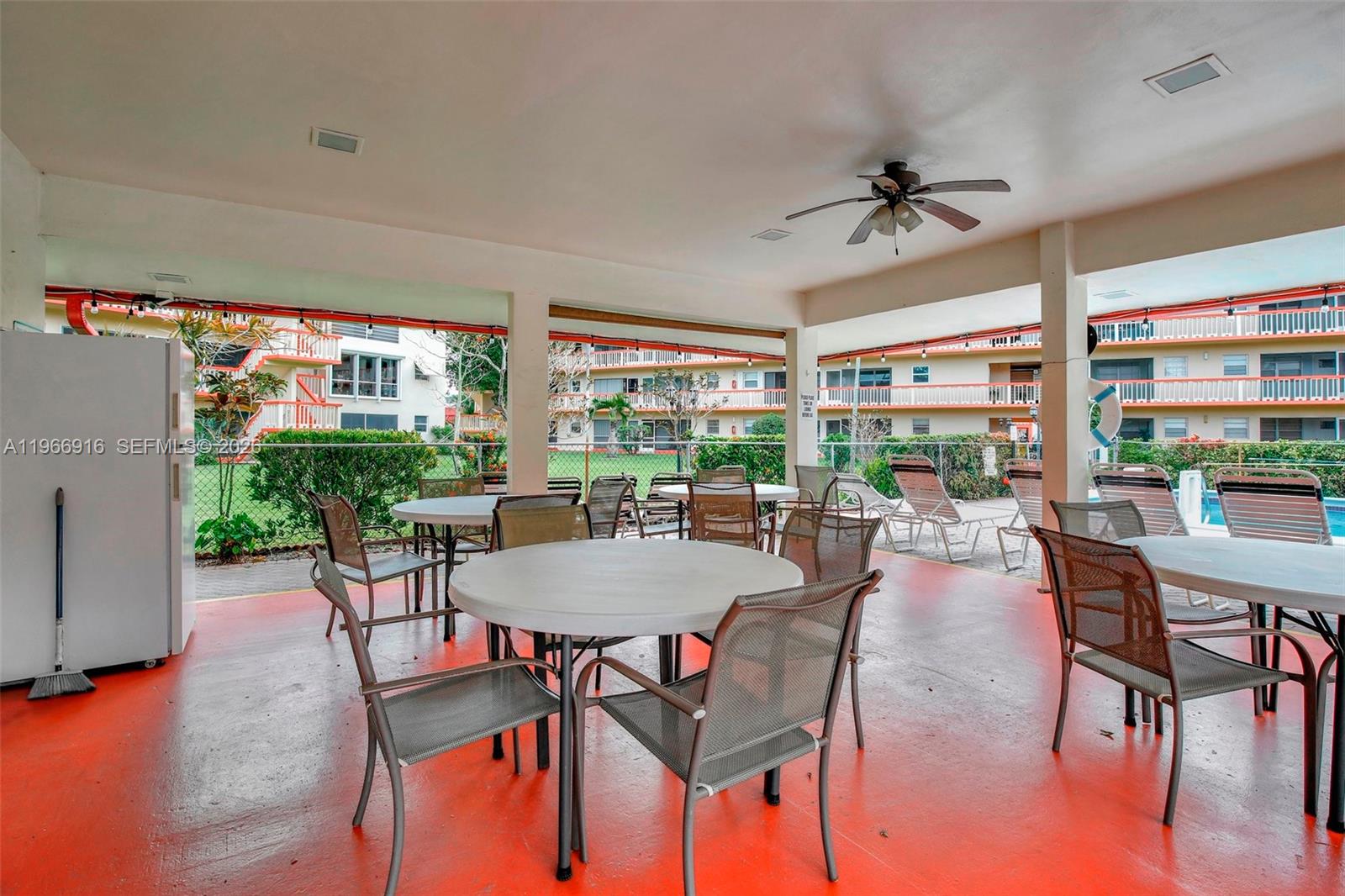 5300 Washington Street, Unit G127 Hollywood, FL 33021 - Photo 25 of 39 a view of a dining room with furniture window and outside view