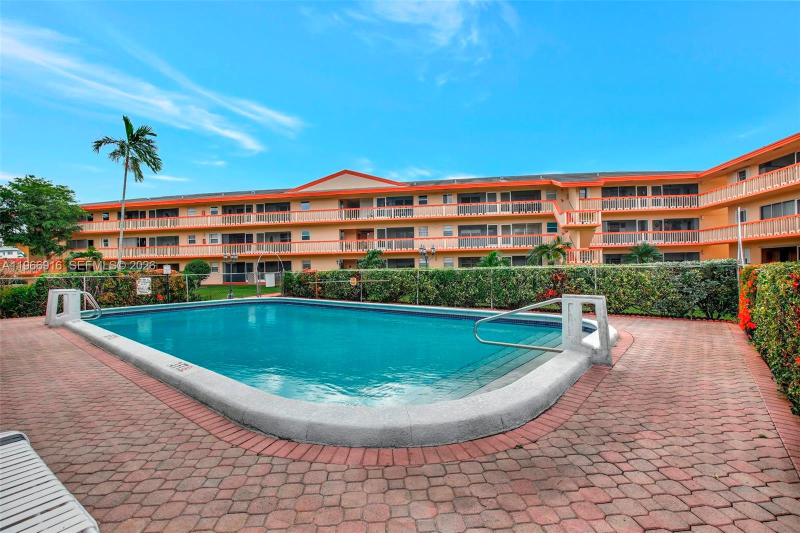 5300 Washington Street, Unit G127 Hollywood, FL 33021 - Photo 27 of 39 a view of a swimming pool and a yard