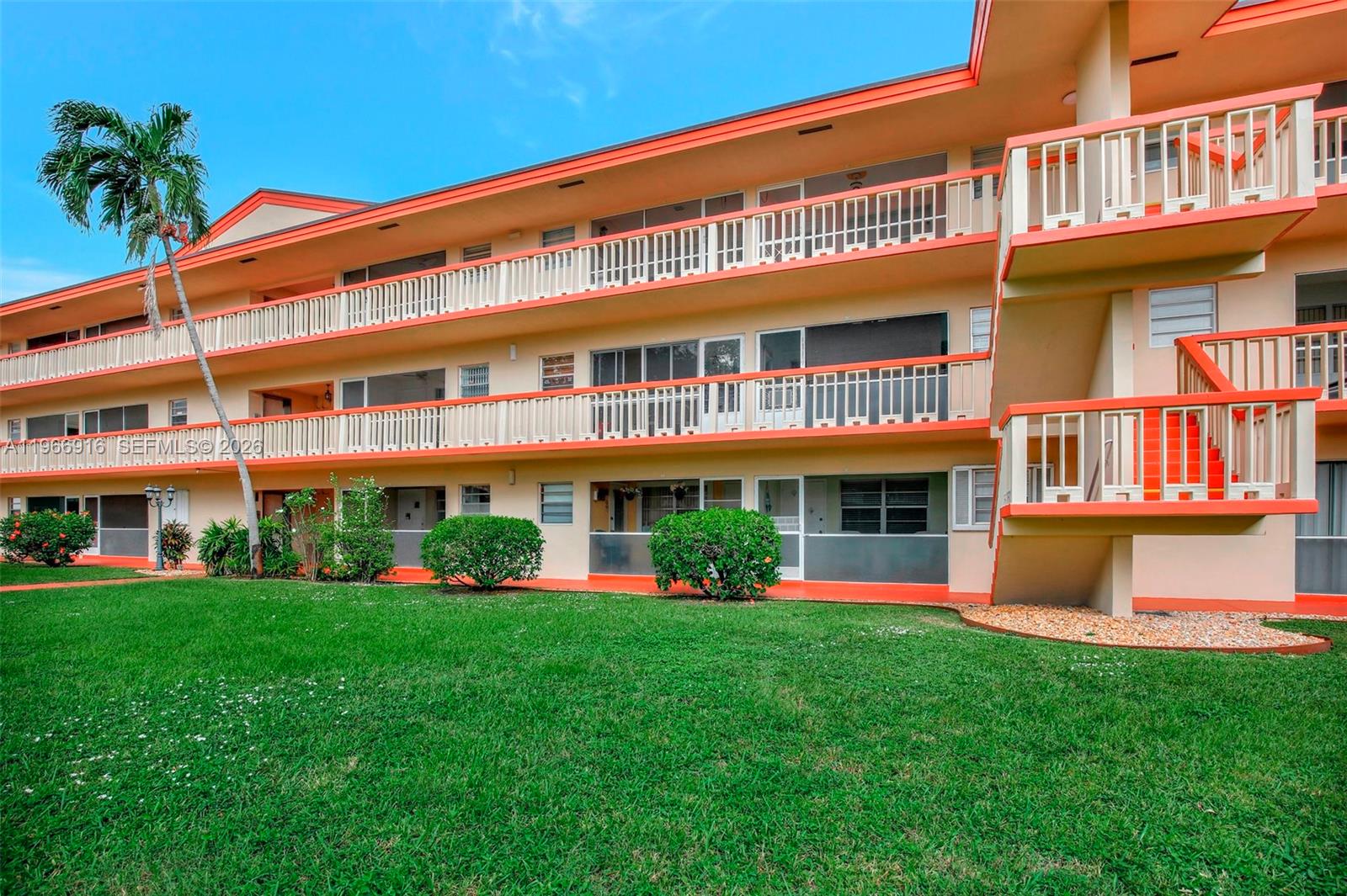 5300 Washington Street, Unit G127 Hollywood, FL 33021 - Photo 4 of 39 a front view of a building with garden