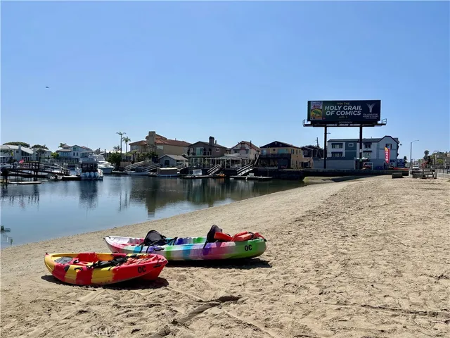 a view of a lake with a car parked