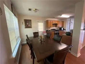 a view of a dining room with furniture