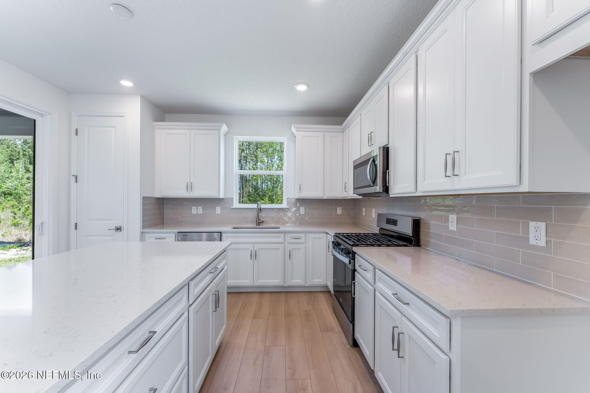 614 Ecliptic Loop Yulee, FL 32097 - Photo 21 of 60 23-web-or-mls-Kitchen