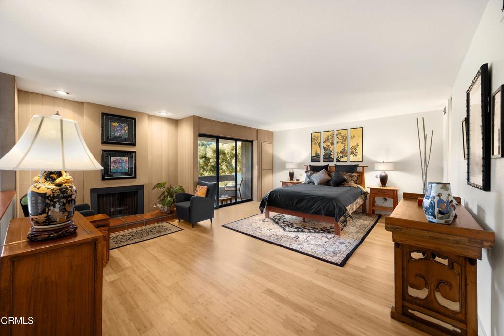 200 Arroyo Terrace Pasadena, CA 91103 - Photo 21 of 66 a living room with furniture large window and a flat screen tv