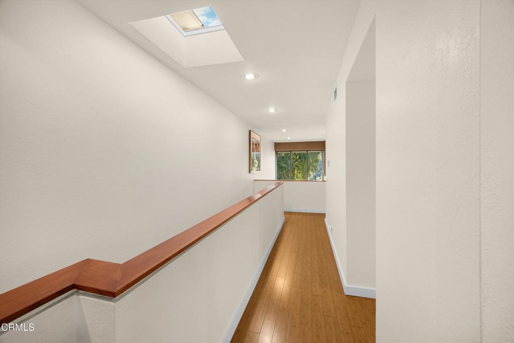 200 Arroyo Terrace Pasadena, CA 91103 - Photo 34 of 66 a view of a room with wooden floor