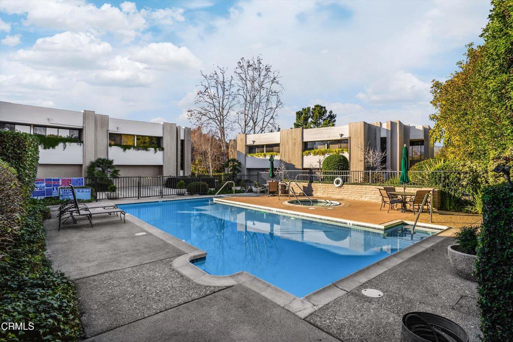 200 Arroyo Terrace Pasadena, CA 91103 - Photo 42 of 66 a view of a house with swimming pool and sitting area