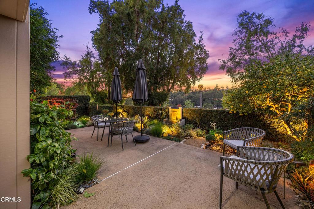 200 Arroyo Terrace Pasadena, CA 91103 - Photo 50 of 66 a view of a patio with couches and table and chairs and potted plants