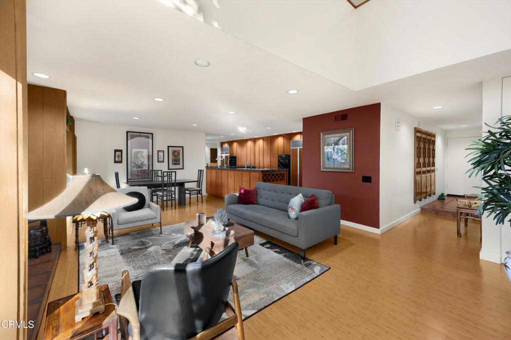 200 Arroyo Terrace Pasadena, CA 91103 - Photo 6 of 66 a living room with furniture and a wooden floor
