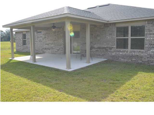 5617 Price Plantation Road Baker, FL 32531 - Photo 2 of 13 a bathroom with mirror