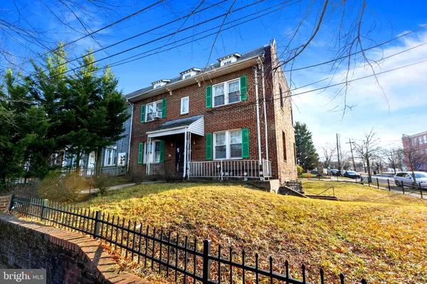 a view of a house with swimming pool