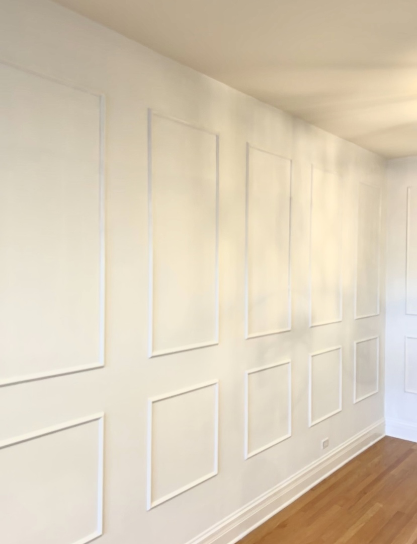 1450 East Northwest Highway, Unit 13 Arlington Heights, IL 60004 - Photo 7 of 33 a view of wooden floor and windows in a room