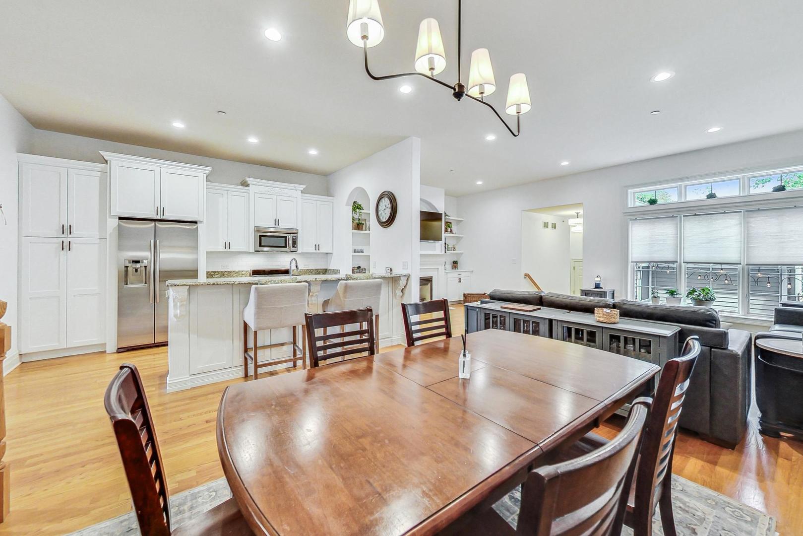 1450 East Northwest Highway, Unit 13 Arlington Heights, IL 60004 - Photo 10 of 33 a view of kitchen dining table and chairs