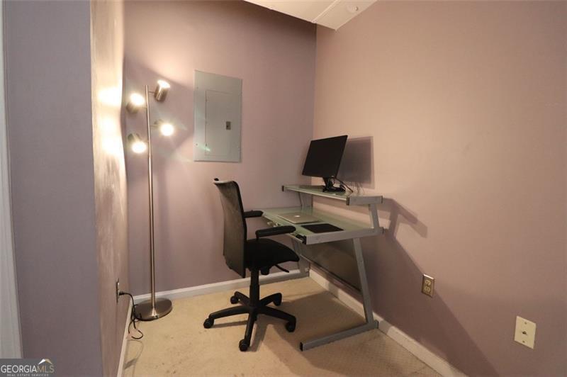 32 Peachtree Street, Unit 1601 Atlanta, GA 30303 - Photo 21 of 55 a view of a workspace with furniture and a window