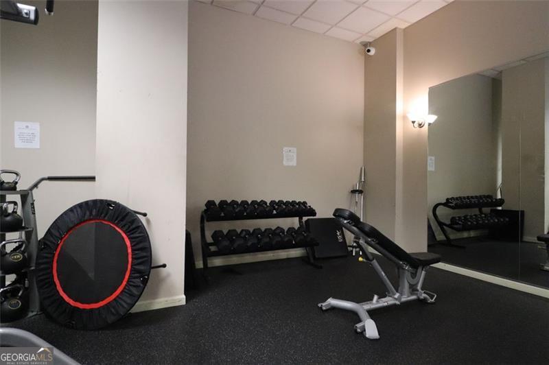 32 Peachtree Street, Unit 1601 Atlanta, GA 30303 - Photo 35 of 55 a view of a room with gym equipment