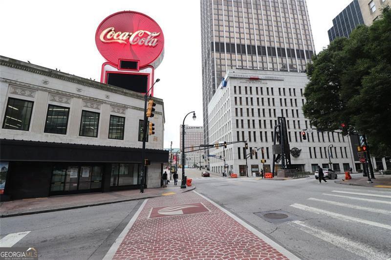 32 Peachtree Street, Unit 1601 Atlanta, GA 30303 - Photo 47 of 55 a front view of a building with a street