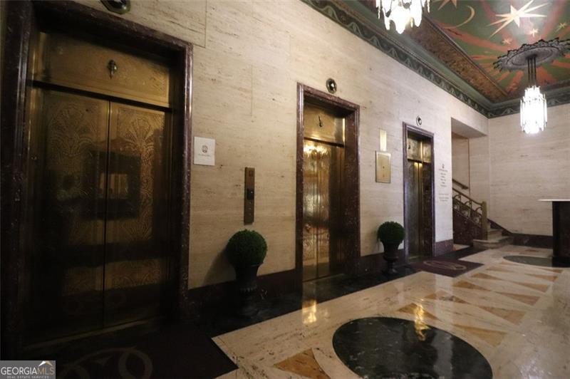 32 Peachtree Street, Unit 1601 Atlanta, GA 30303 - Photo 6 of 55 a bathroom with a sink and a mirror