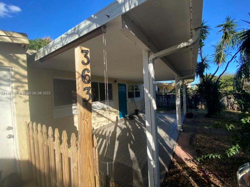 a view of a house with a porch