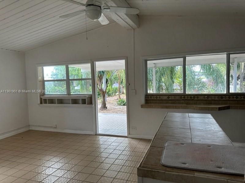 363 Glouchester Street Boca Raton, FL 33487 - Photo 12 of 13 an empty room with windows