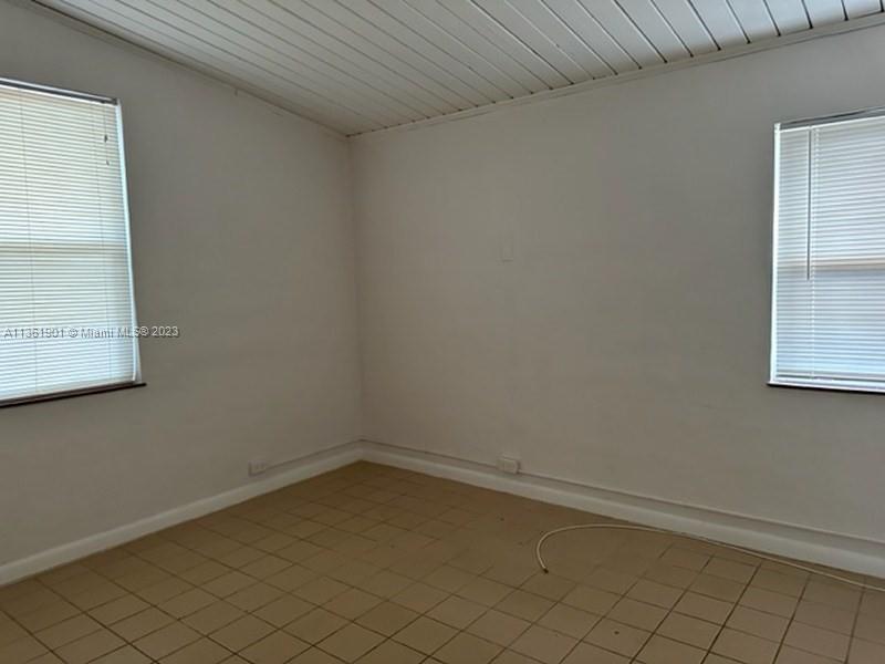 363 Glouchester Street Boca Raton, FL 33487 - Photo 10 of 13 a view of a room that has a window