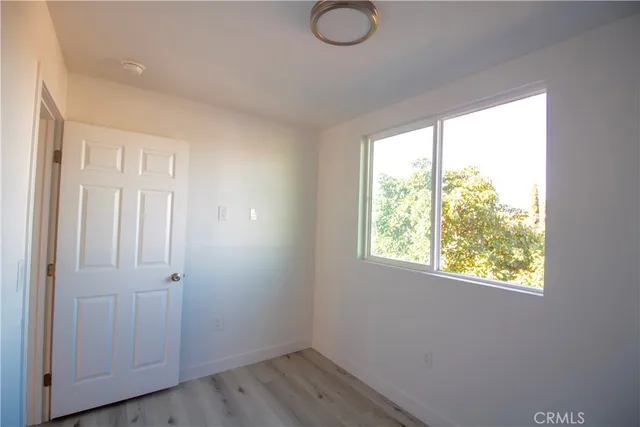 a view of a room that has a window in it