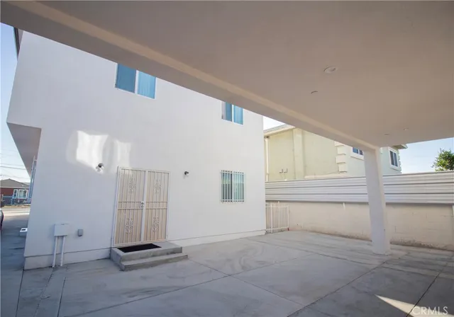 a view of a hallway with a view of bedroom