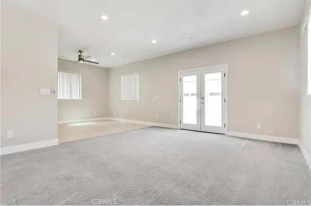 a bathroom with a double vanity sink toilet and shower
