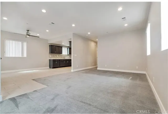 a kitchen with a stove sink and microwave