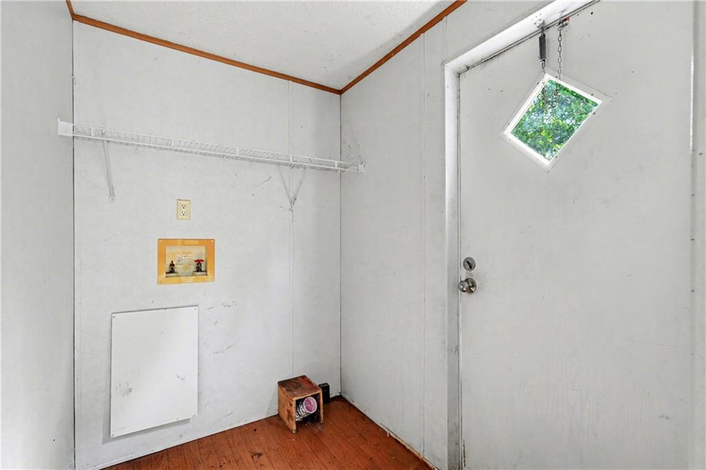 249 John Golden Road Temple, GA 30179 - Photo 44 of 45 a view of a room with wooden floor