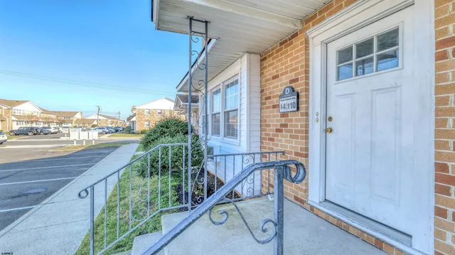 a view of balcony with furniture
