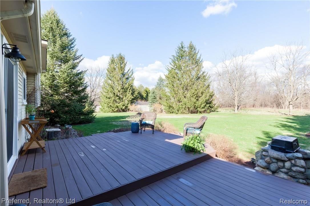 9470 Michigamme Road Clarkston, MI 48348 - Photo 23 of 27 Wooded back yard
