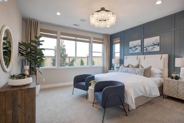 a bedroom with bed and window