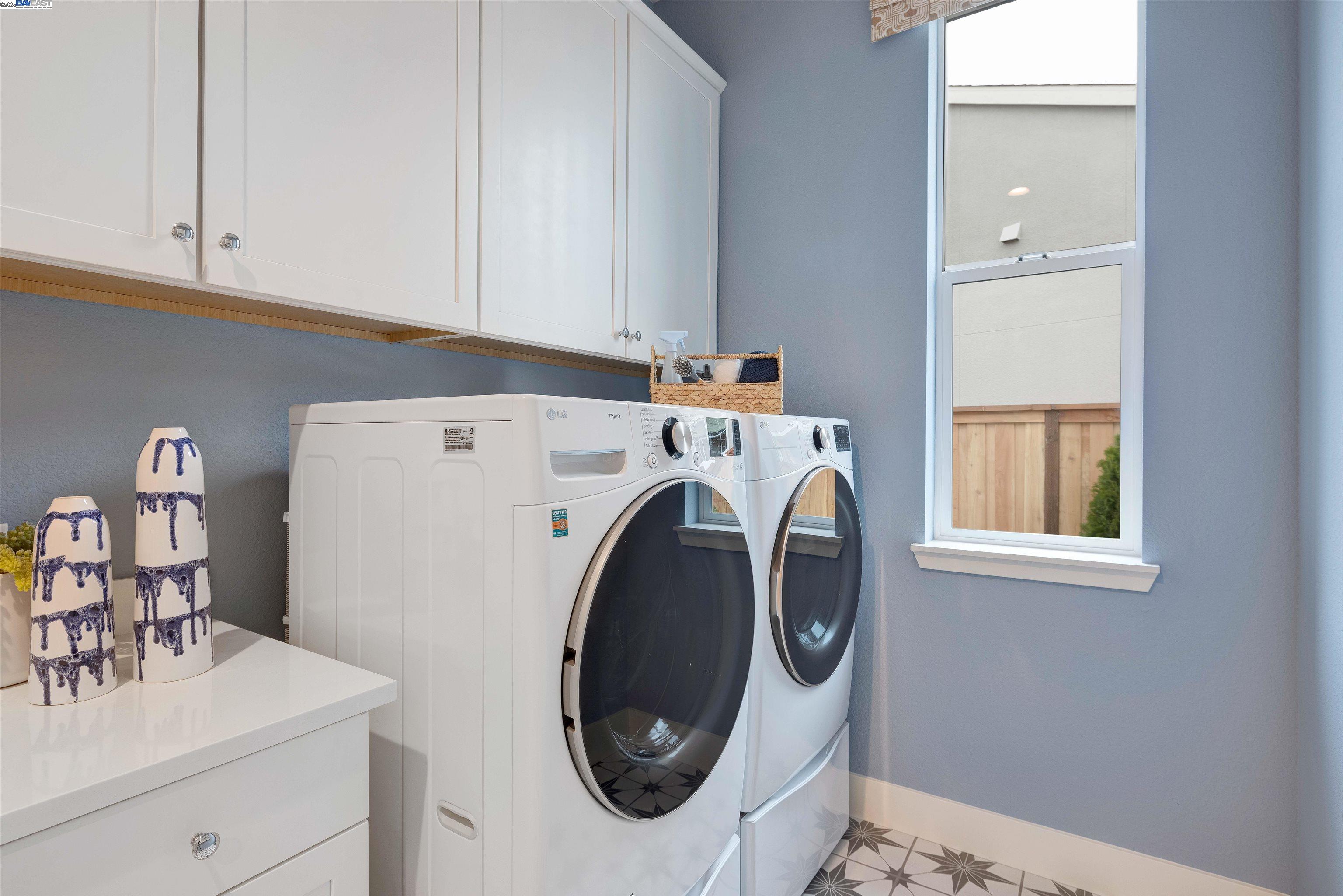 1371 Crescent Avenue Manteca, CA 95336 - Photo 39 of 55 a utility room with dryer and washer