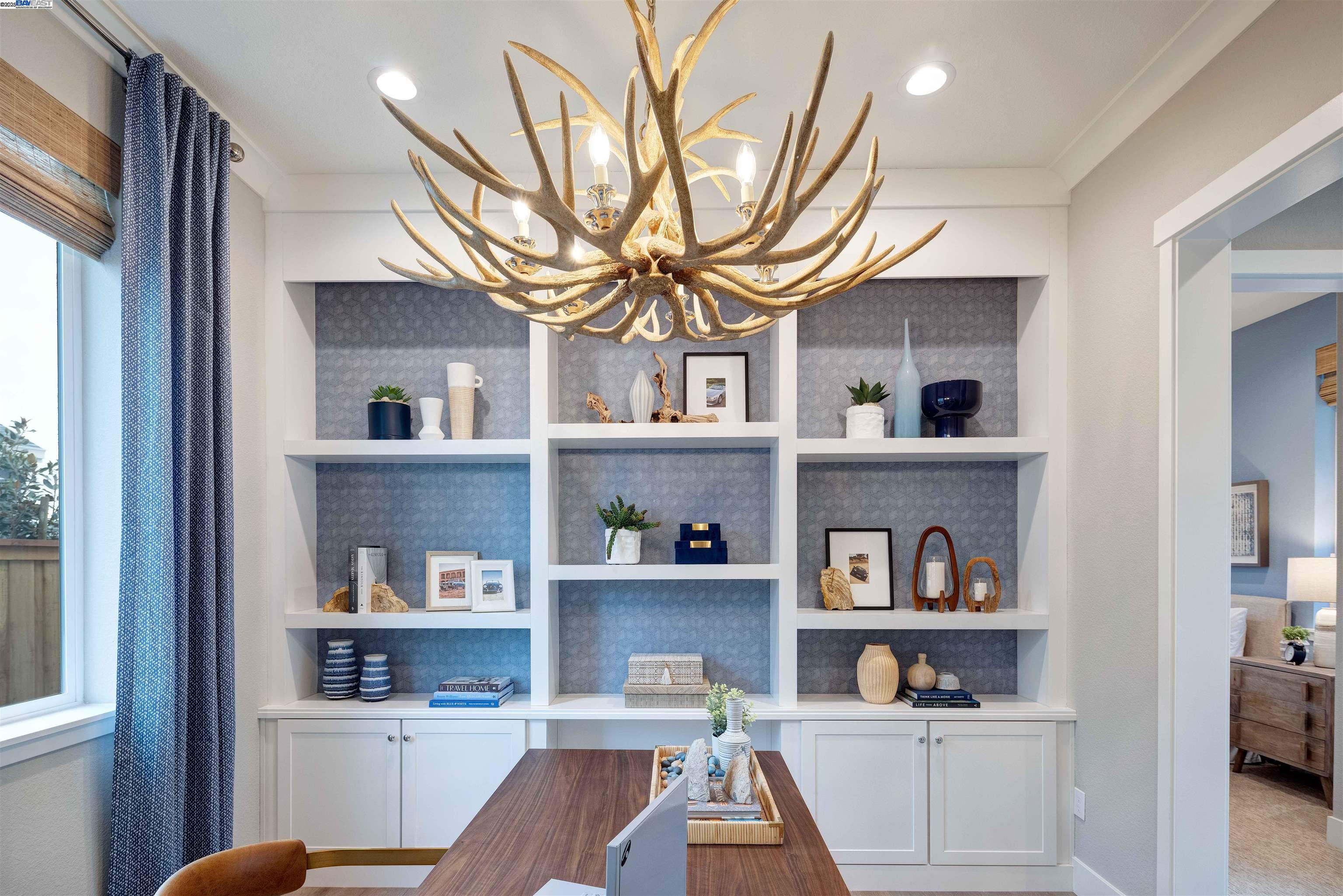 1371 Crescent Avenue Manteca, CA 95336 - Photo 42 of 55 a workspace with furniture and a book shelf