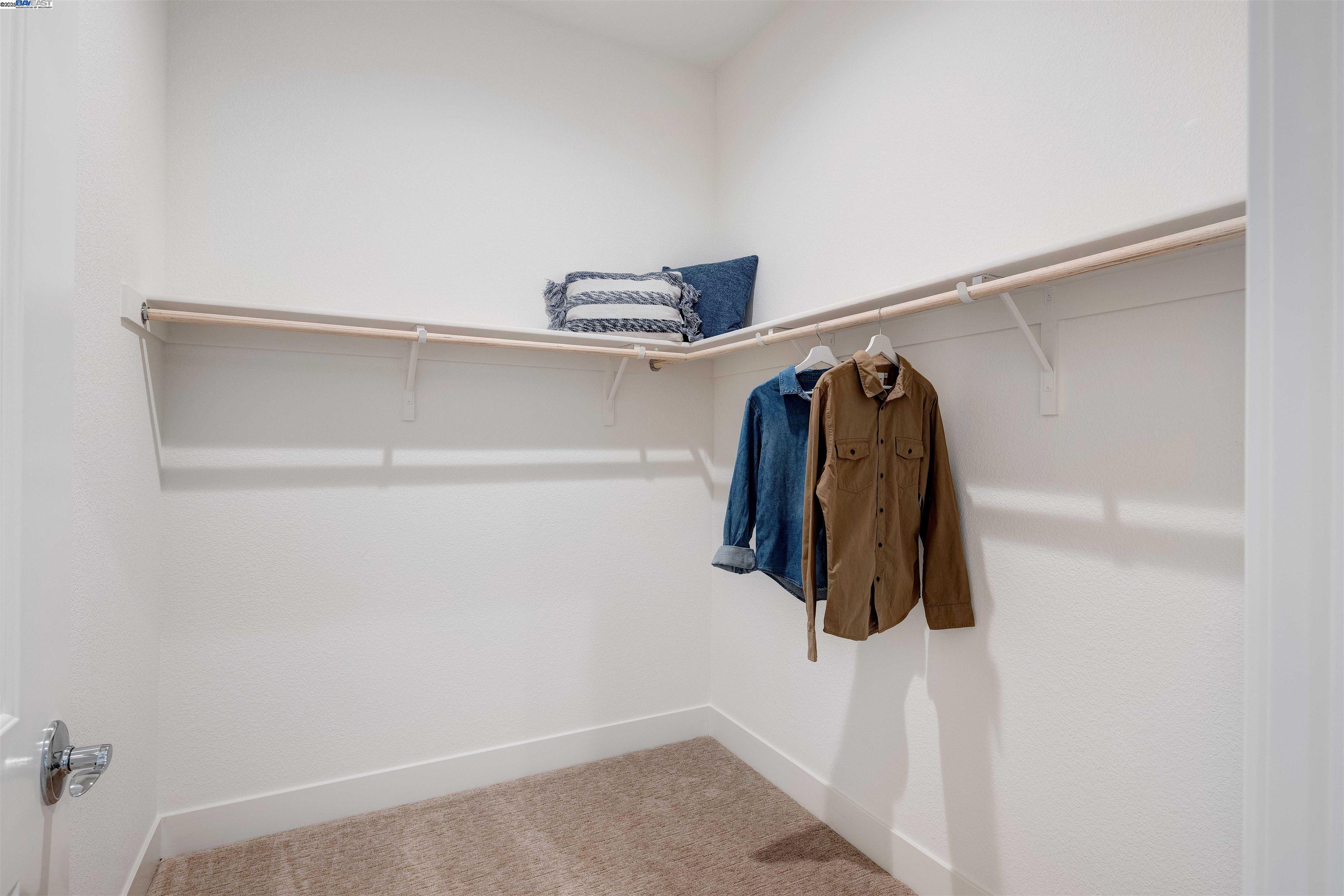1371 Crescent Avenue Manteca, CA 95336 - Photo 45 of 55 a view of walk in closet with clothes