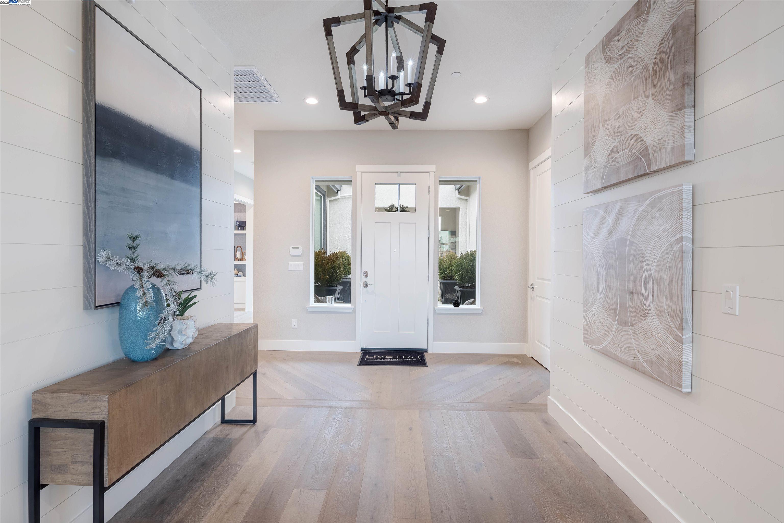 1371 Crescent Avenue Manteca, CA 95336 - Photo 8 of 55 a living room with furniture and a chandelier