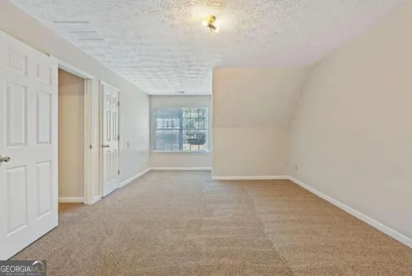 en empty room with windows