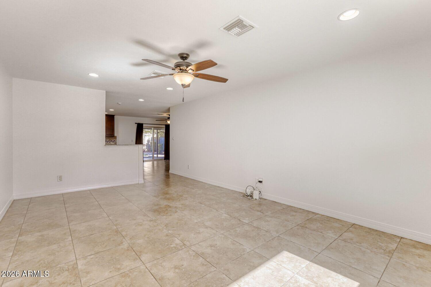 2030 East Colgate Drive Tempe, AZ 85283 - Photo 7 of 26 Living room into family room and kitchen