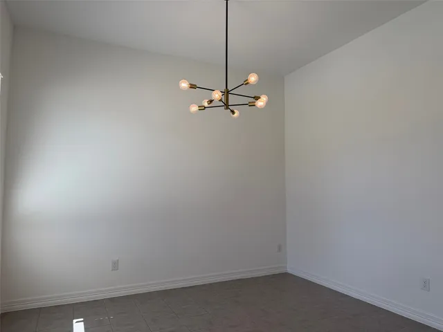 a view of a room with a fan