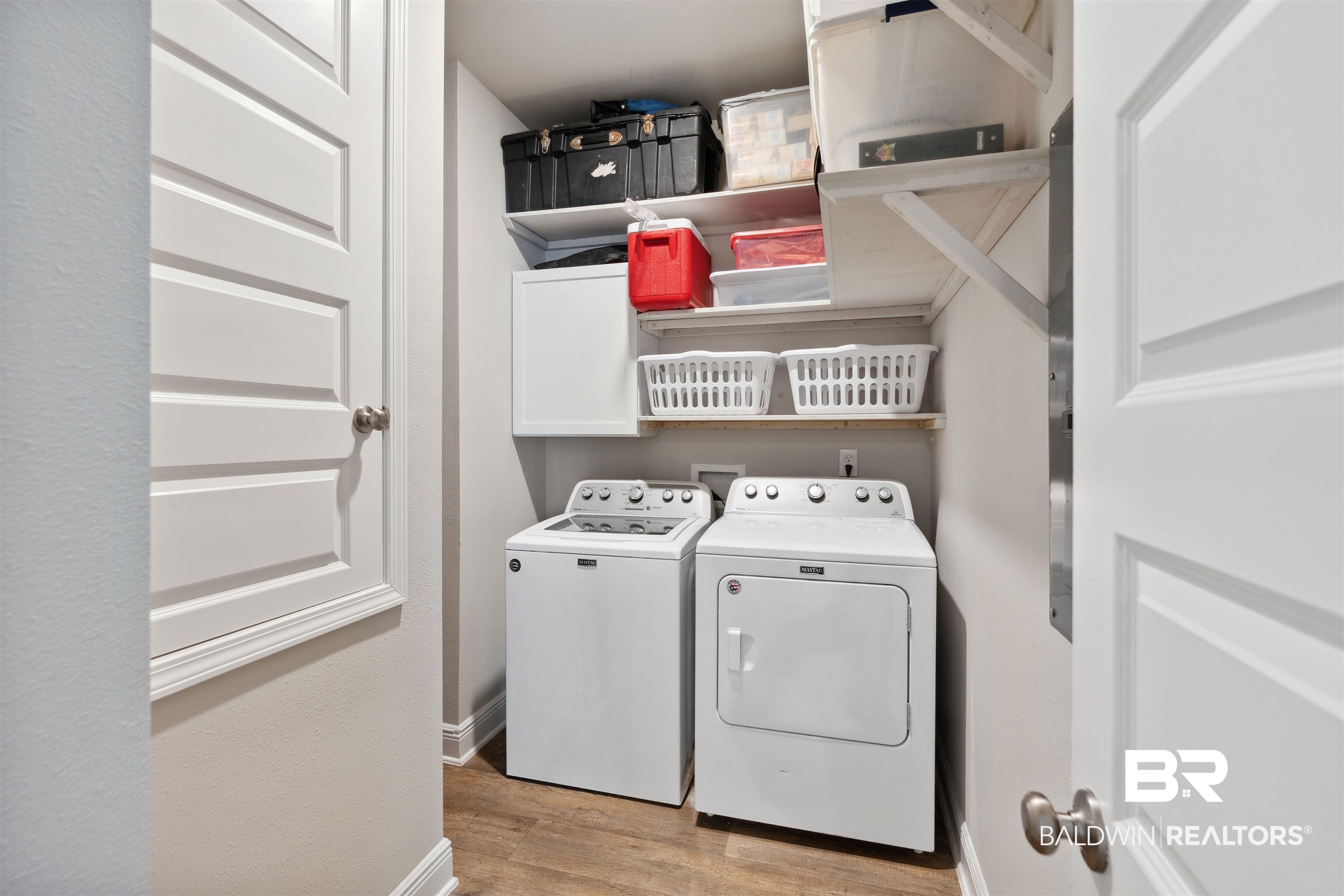 23809 Devonfield Lane Daphne, AL 36526 - Photo 22 of 29 Laundry room with independent washer and dryer, light wood-type flooring, laundry area, and baseboards