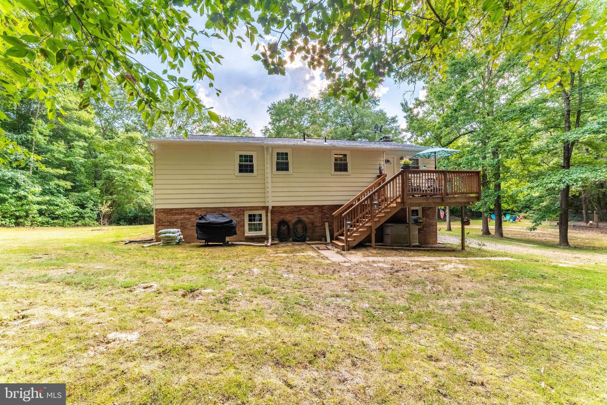 9050 Riverside Road Nanjemoy, MD 20662 - Photo 5 of 27 Nice big backyard with deck